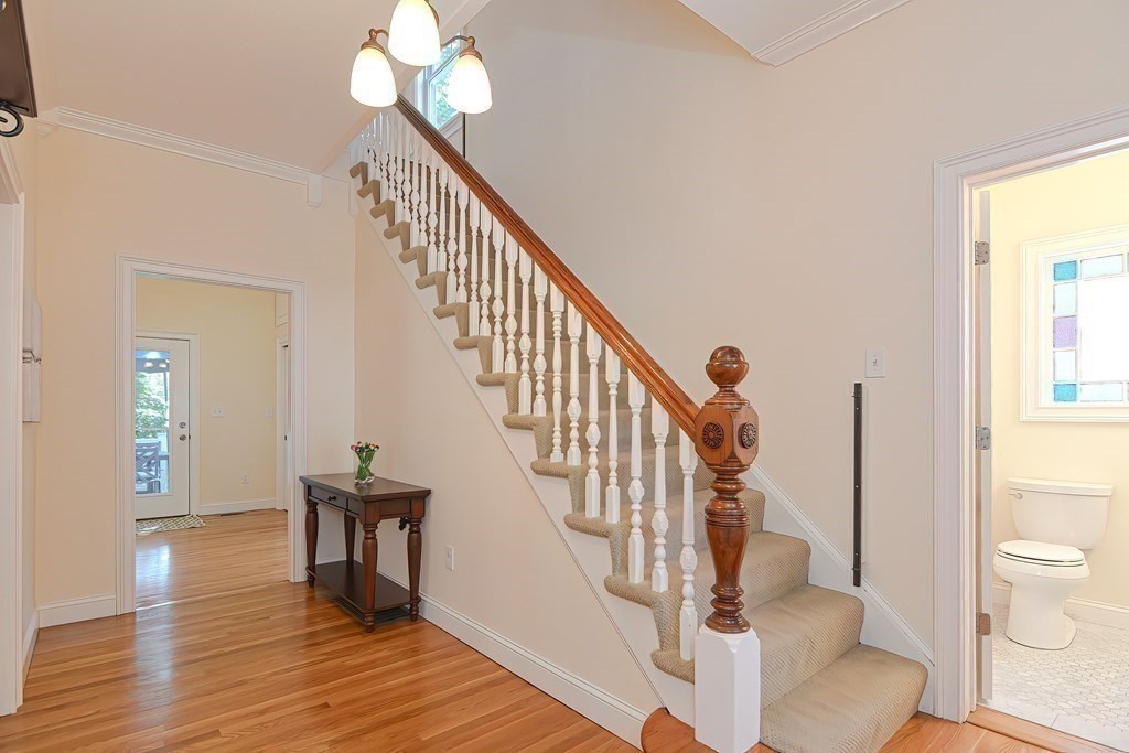 228 Cherry Street Newton, MA 02465 - Photo 14 of 42 a view of entryway and hall with wooden floor