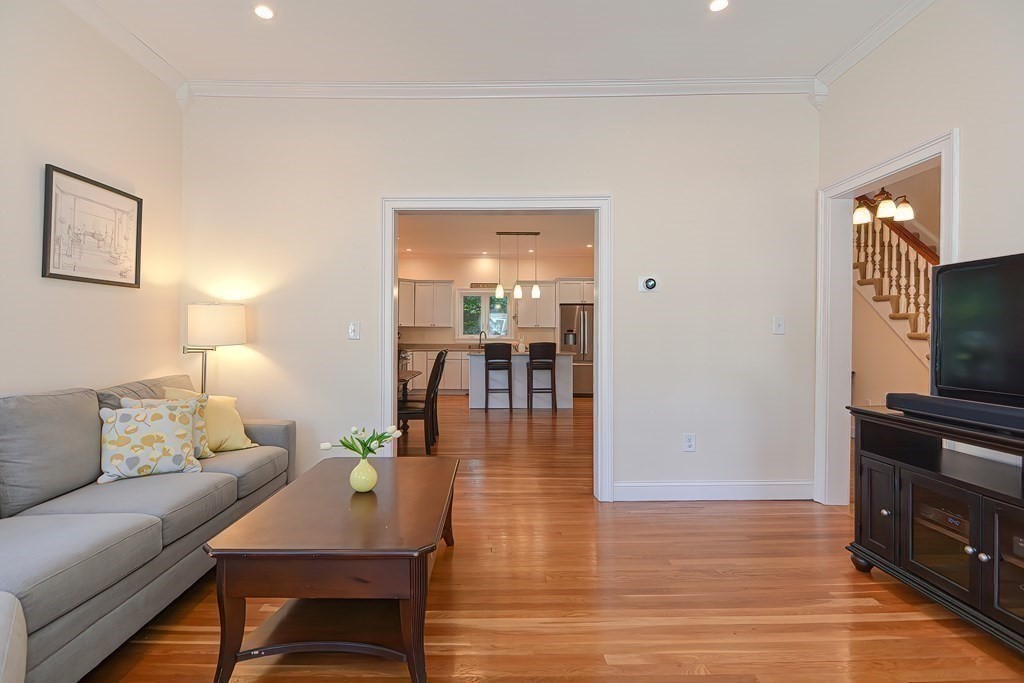 228 Cherry Street Newton, MA 02465 - Photo 19 of 42 a living room with furniture and a flat screen tv