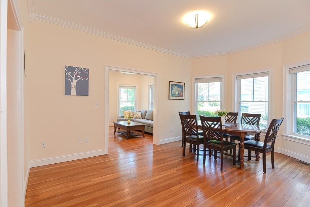 228 Cherry Street Newton, MA 02465 - Photo 21 of 42 a view of a dining room with furniture and wooden floor