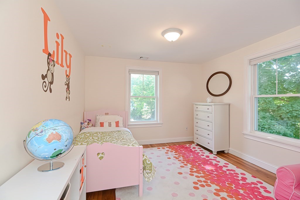 228 Cherry Street Newton, MA 02465 - Photo 23 of 42 a bedroom with a bed and a window