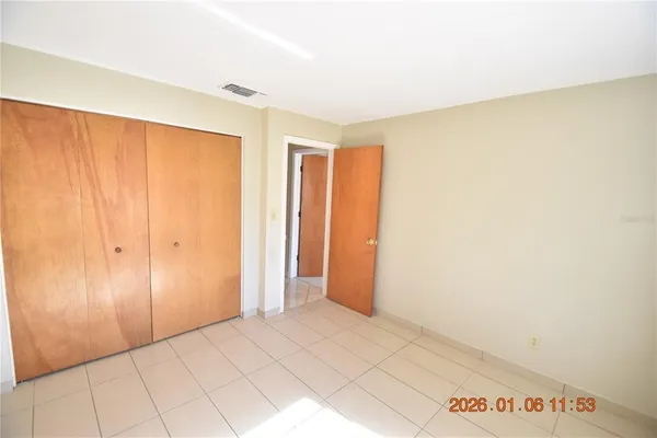 a bathroom with a sink a mirror and a shower