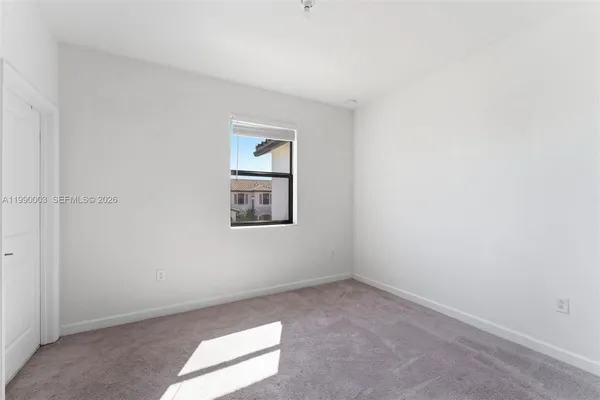 an empty room with a window