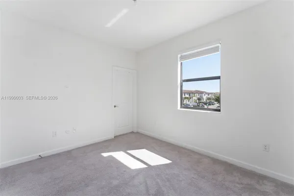 an empty room with a window