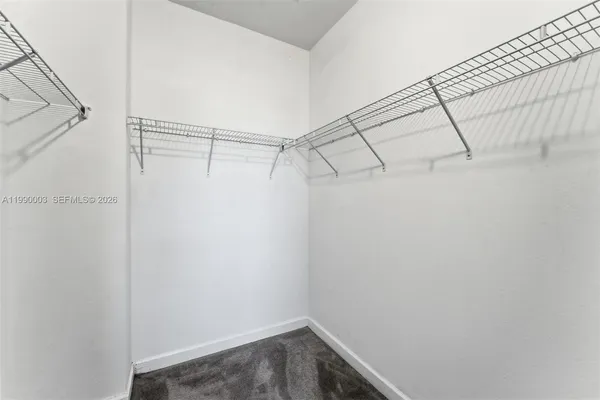 a view of a room with racks on the wall