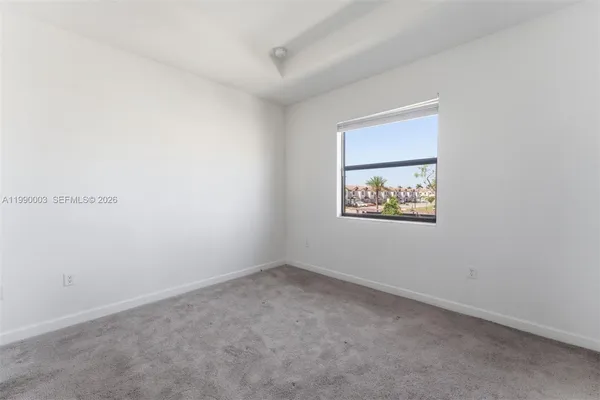 an empty room with a window