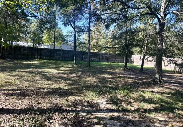 a view of outdoor space and yard