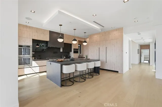 a living room with fireplace furniture and a flat screen tv