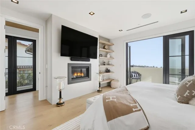 a view of a city street from a balcony