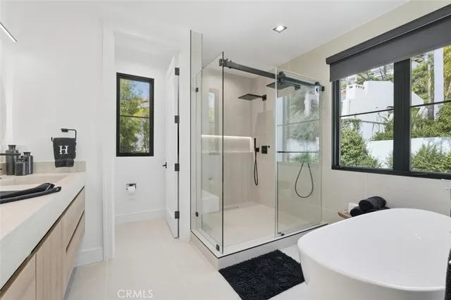 a view of gallery with wooden floor and window