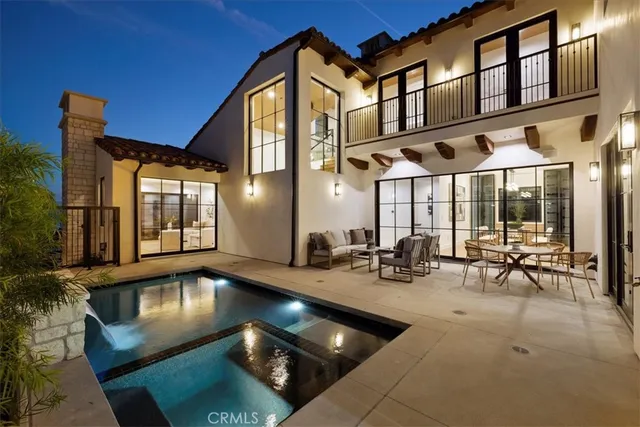 a view of a building with sitting area