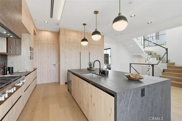 a kitchen with sink and window