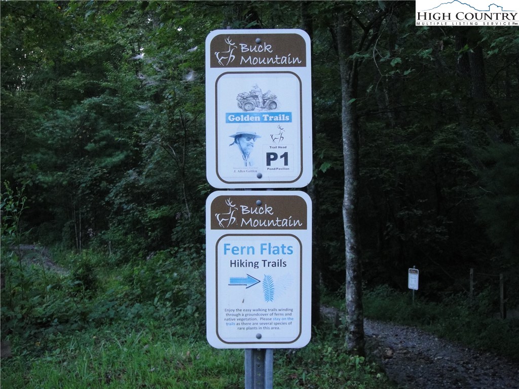 Lot 18 Wolf Pen Road Purlear, NC 28665 - Photo 24 of 37 a sign on the side of the road