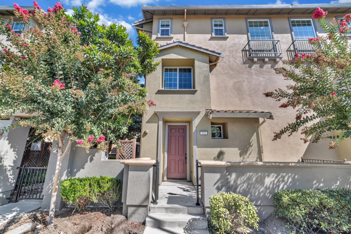 576 Almaden Walk Loop San Jose, CA 95125 - Photo 1 of 34 an aerial view of a house with a yard and potted plants
