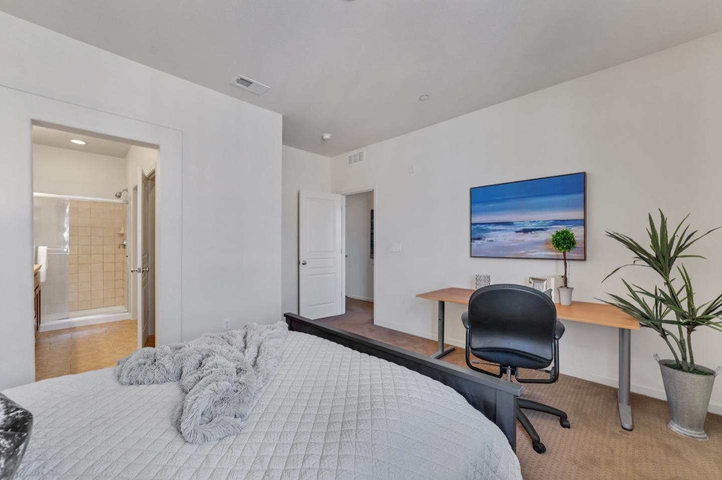 576 Almaden Walk Loop San Jose, CA 95125 - Photo 14 of 34 a bedroom with a workspace