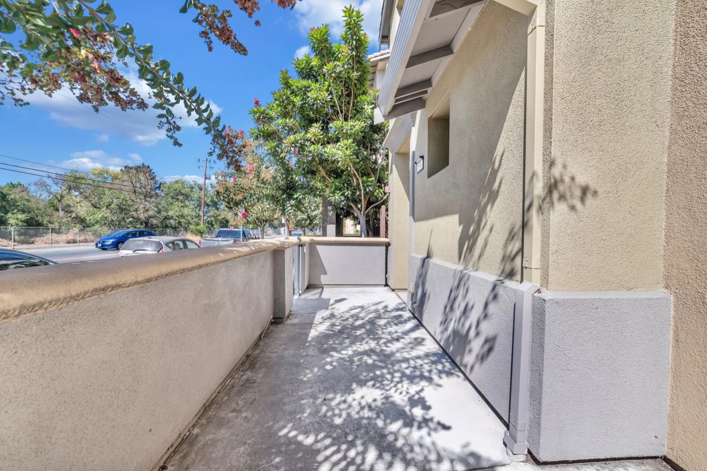 576 Almaden Walk Loop San Jose, CA 95125 - Photo 24 of 34 a view of balcony with wooden floor and fence