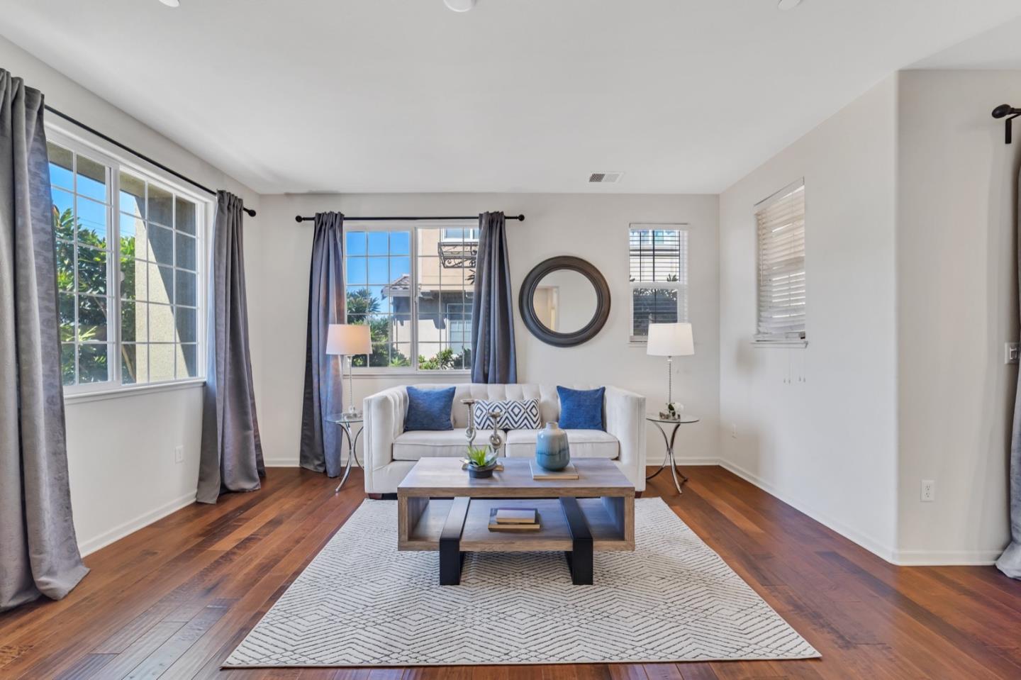 576 Almaden Walk Loop San Jose, CA 95125 - Photo 5 of 34 a living room with furniture and a rug