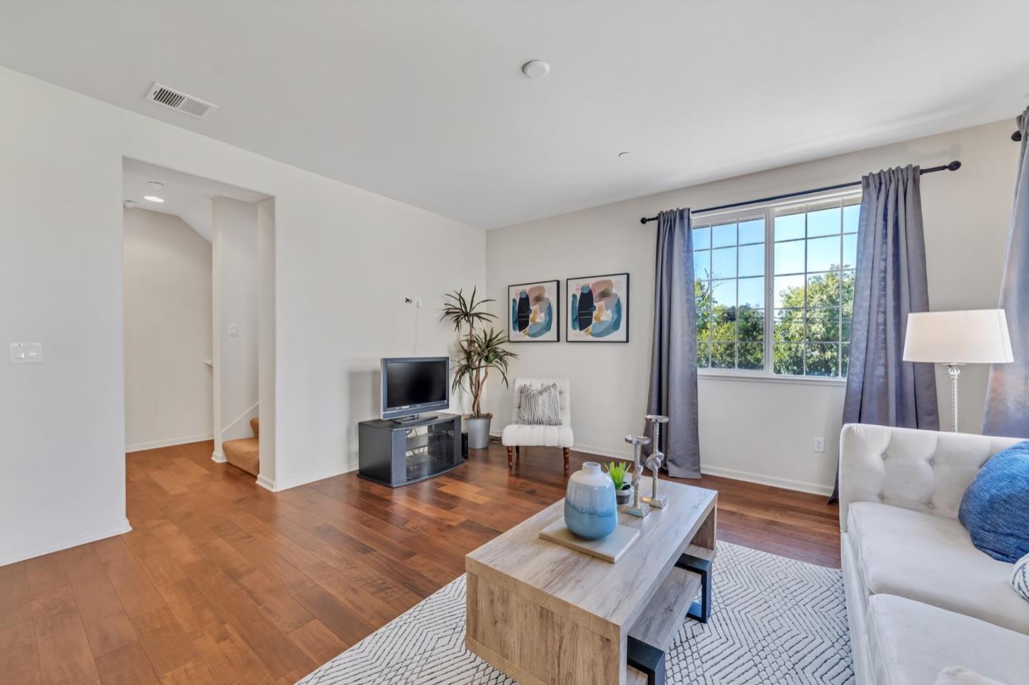 576 Almaden Walk Loop San Jose, CA 95125 - Photo 6 of 34 a living room with furniture and a window