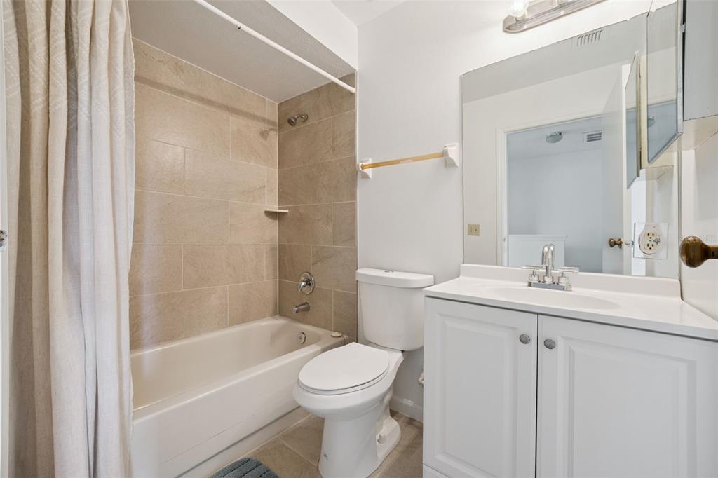 498 Green Spring Circle Winter Springs, FL 32708 - Photo 14 of 20 a bathroom with a sink toilet and shower