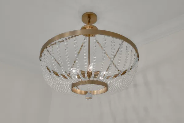 a bathroom with a granite countertop sink a mirror and shower