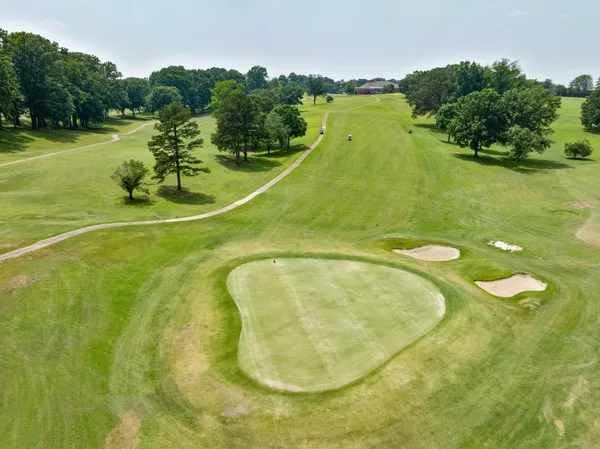 a house with yard in front of it