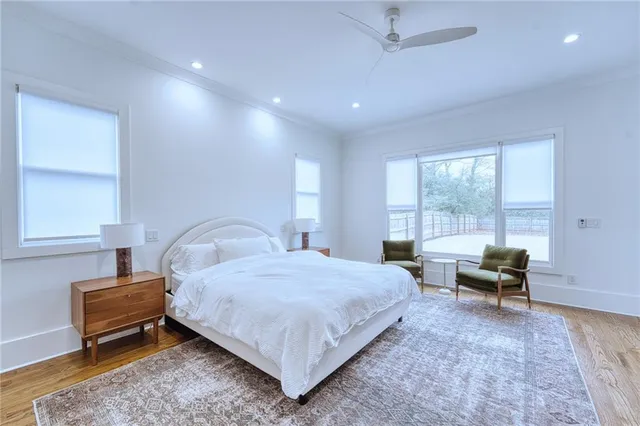 a bedroom with a bed and a couch