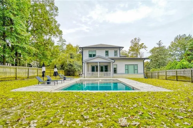 a view of a house with a swimming pool