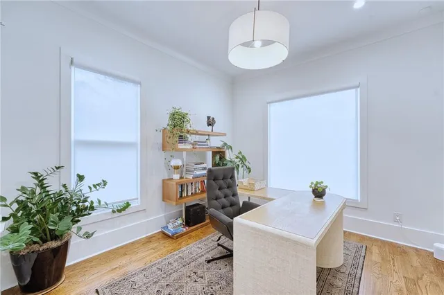 a view of a workspace with furniture