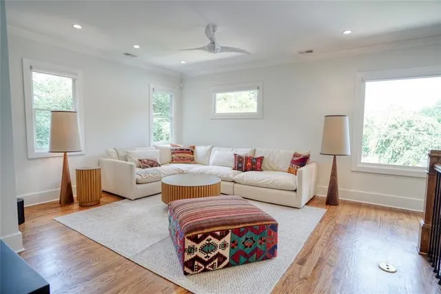 a view of a room with wooden floor