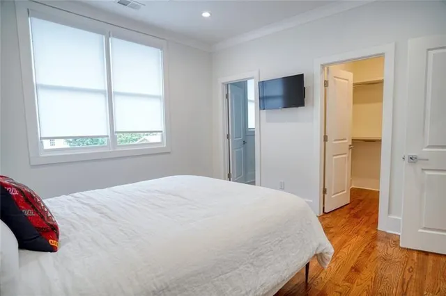 a bedroom with a bed and furniture