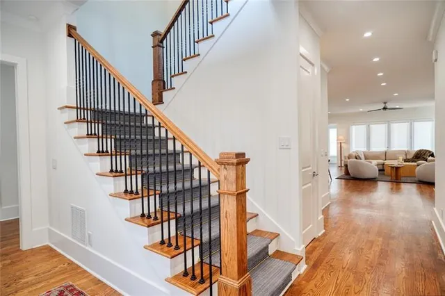 a living room with fireplace furniture and a flat screen tv