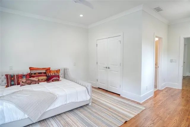 a bathroom with double sink and a mirror