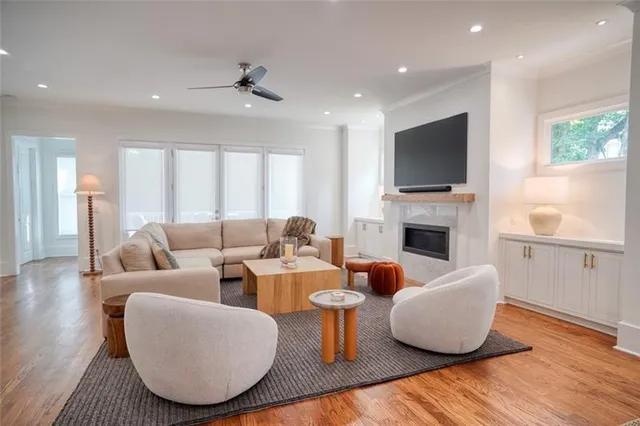a living room with furniture a rug and a couch