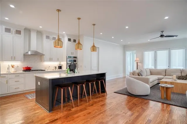 a kitchen with a stove and cabinets