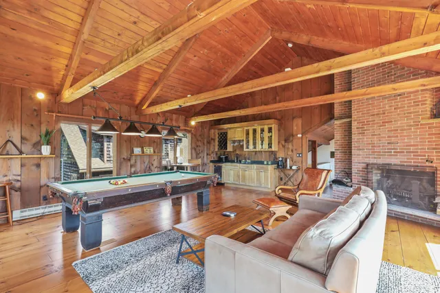 a bathroom with a sink toilet and mirror
