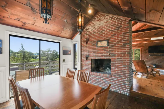 a living room with furniture and a stairs