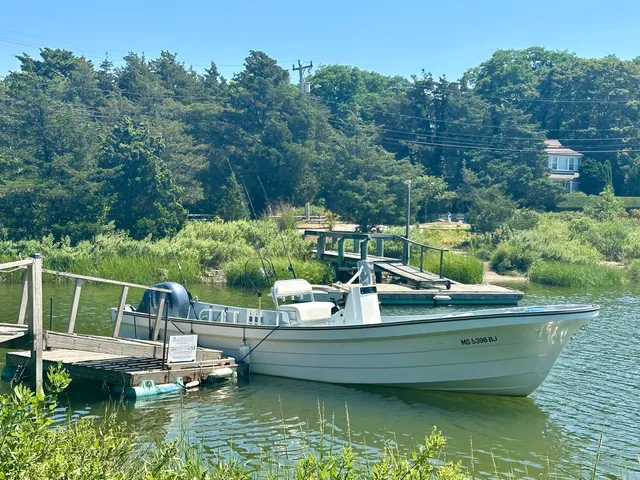 a view of a patio with a table and chairs