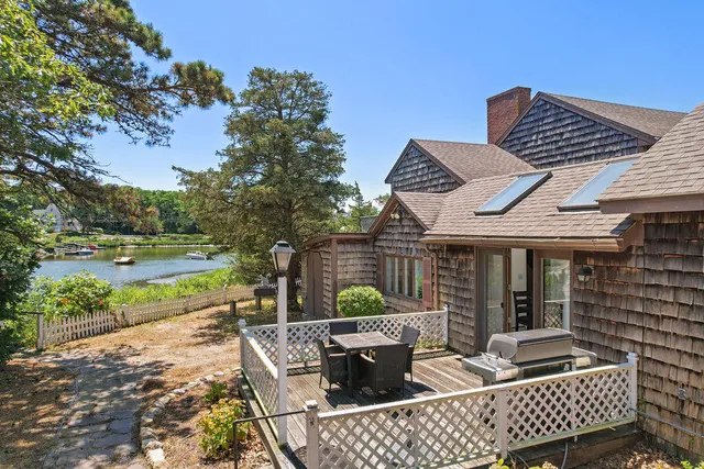 a backyard of a house with seating space