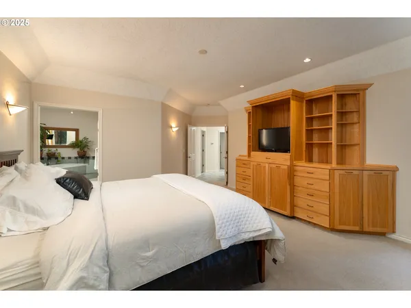 a bedroom with a bed and furniture