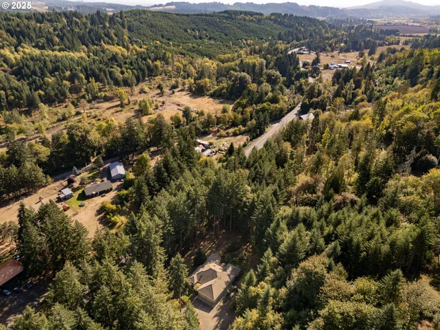 a view of a back yard of a house