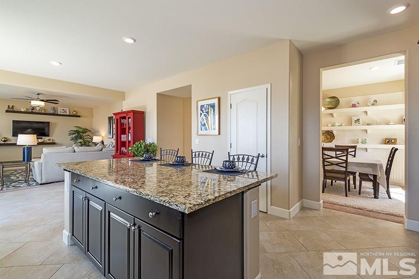 10171 Quintana Drive Reno, NV 89521 - Photo 12 of 25 a kitchen that has a table and chairs in it