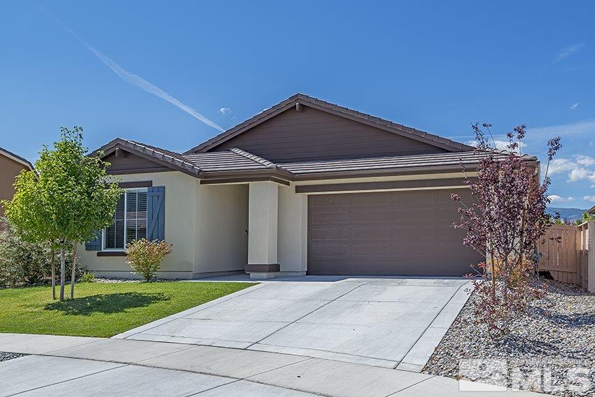 10171 Quintana Drive Reno, NV 89521 - Photo 23 of 25 a front view of a house with garden