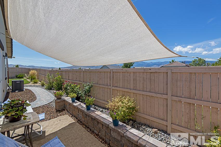 10171 Quintana Drive Reno, NV 89521 - Photo 24 of 25 a garden view with a seating space