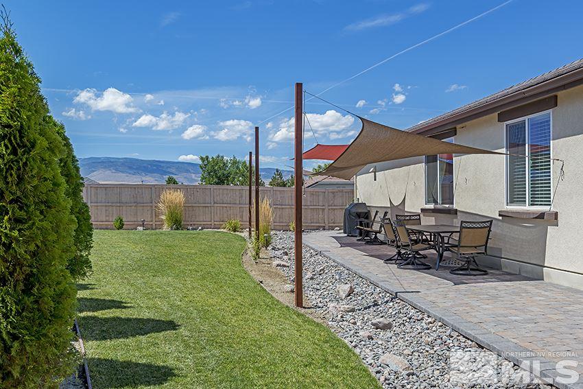 10171 Quintana Drive Reno, NV 89521 - Photo 3 of 25 a view of a backyard with sitting area