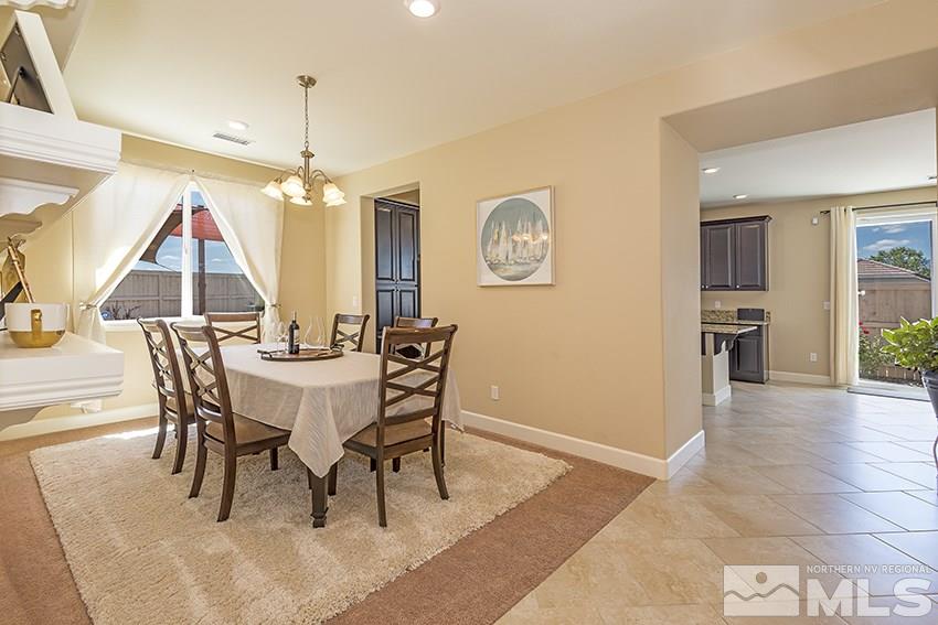 10171 Quintana Drive Reno, NV 89521 - Photo 6 of 25 a dining room with furniture and window