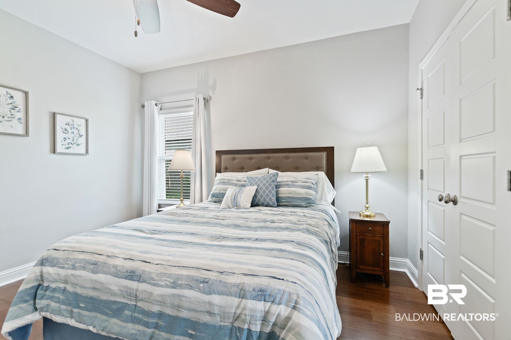 31541 Hoot Owl Road Daphne, AL 36527 - Photo 29 of 51 Bedroom featuring dark hardwood / wood-style flooring and ceiling fan
