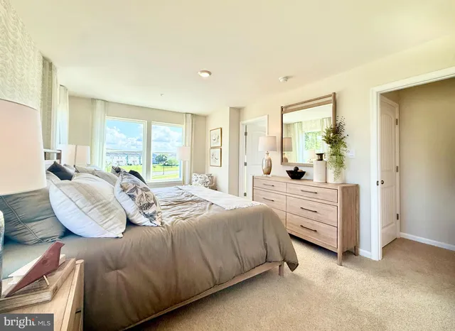 a bathroom with a mirror and a shower