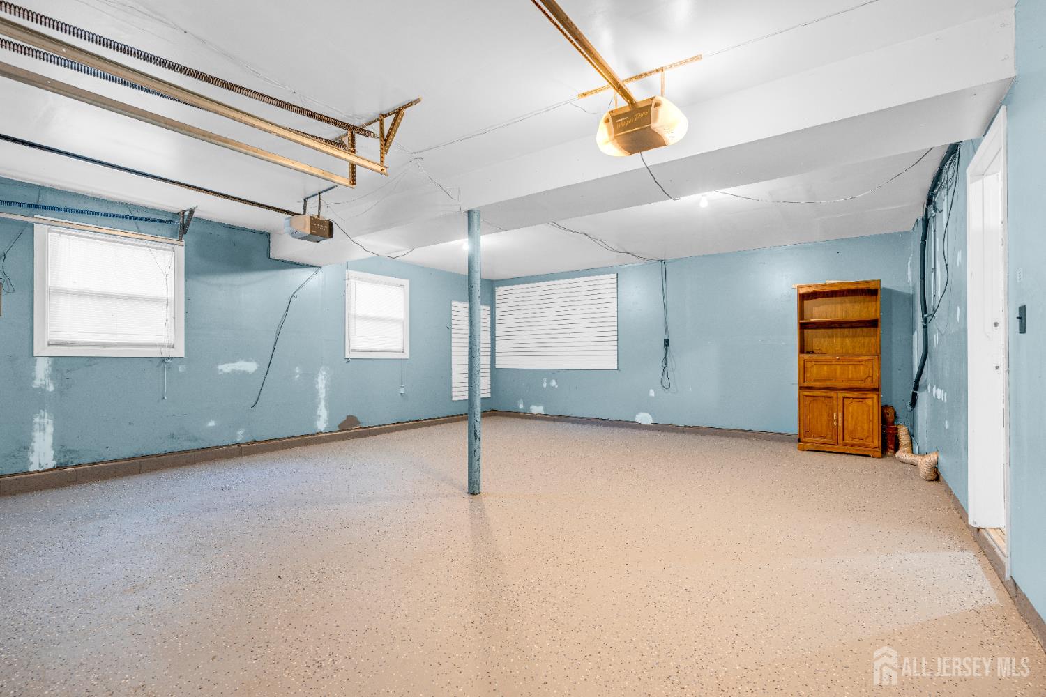 6 Marc Court Edison, NJ 08820 - Photo 34 of 42 an empty room with windows and dryer