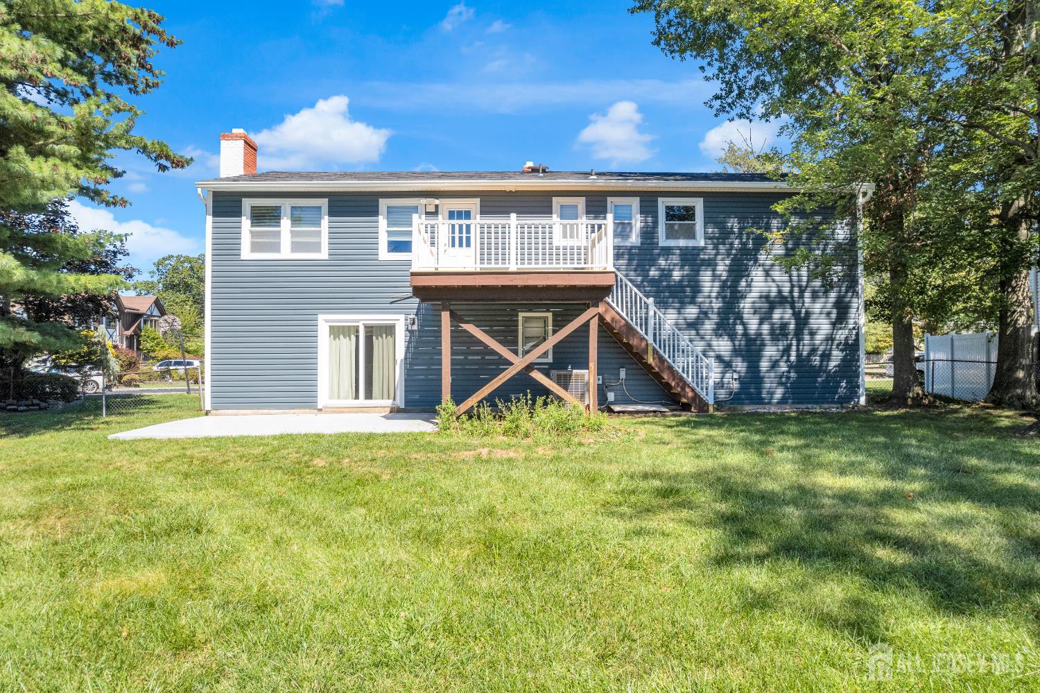 6 Marc Court Edison, NJ 08820 - Photo 35 of 42 a view of a house with a backyard