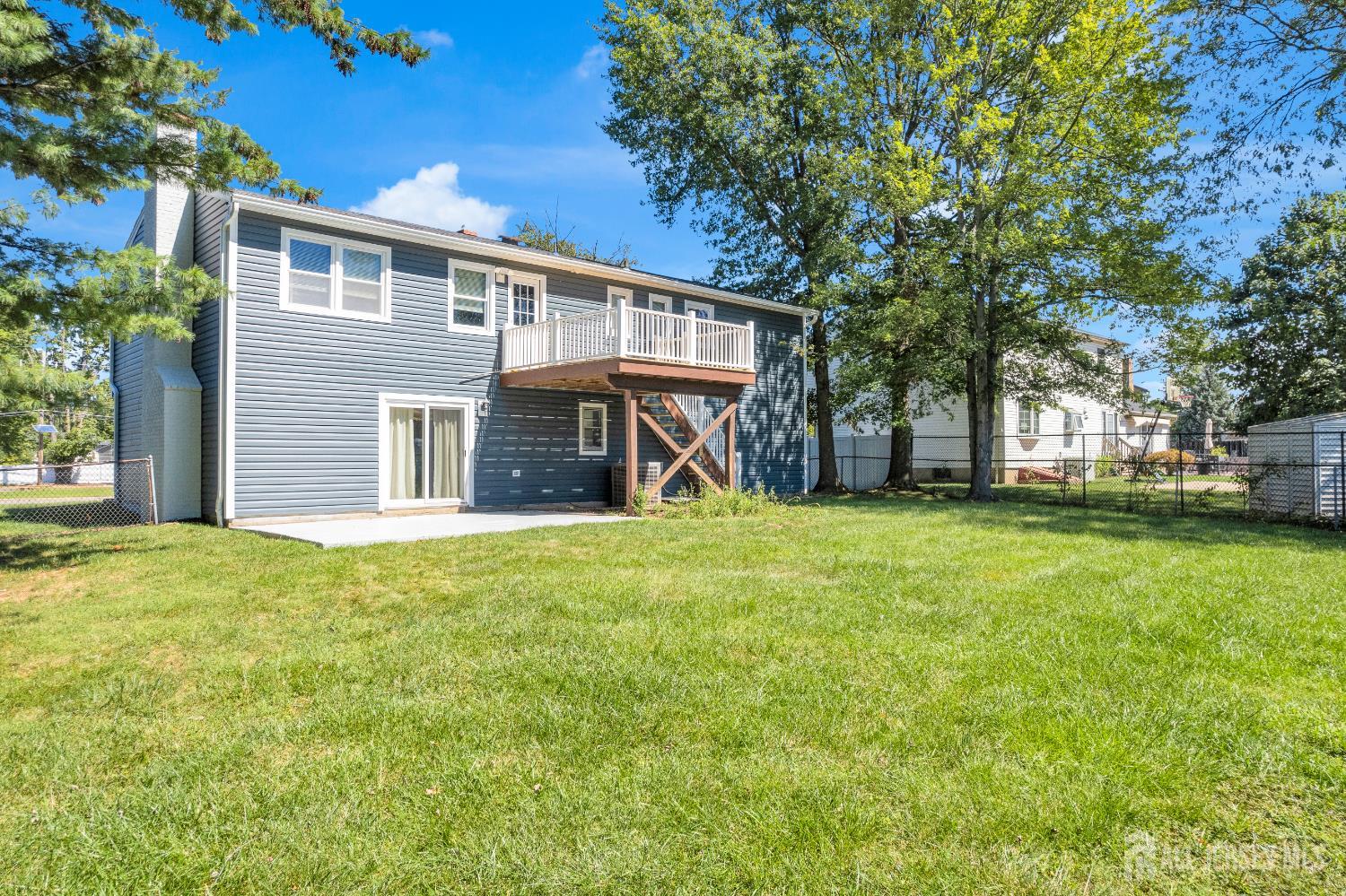 6 Marc Court Edison, NJ 08820 - Photo 37 of 42 front view of a house with a yard