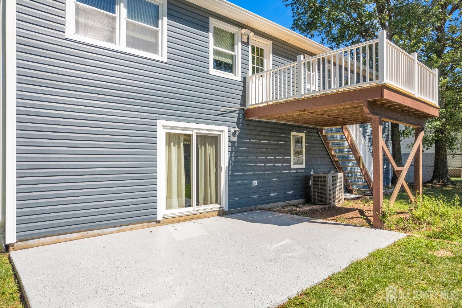 6 Marc Court Edison, NJ 08820 - Photo 38 of 42 a view of a house with backyard and porch